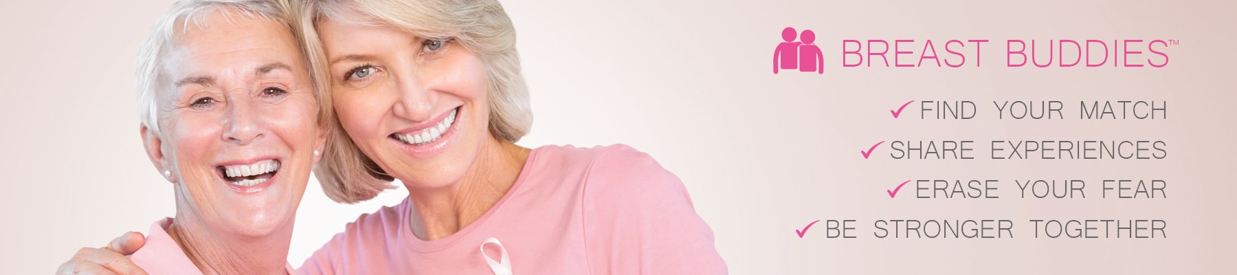 breast buddies program showcasing two middle aged women dressed in pink hugging each other
